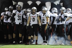 Leopard players wait inside the leopard head prior to the Wylie East game.