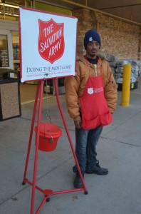 Keith Jones and the Red Kettle he volunteers for outside a local Kroger Grocery Store,