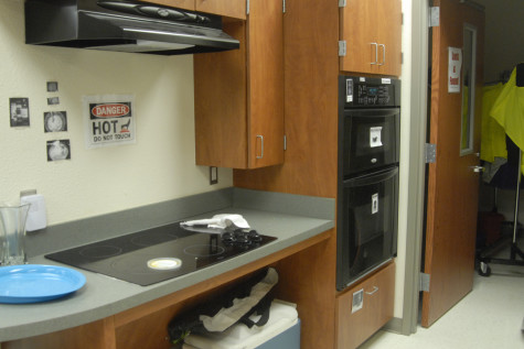 A stove, a microwave, an oven, and a dish washer are a few of the many features of the life skills room. 