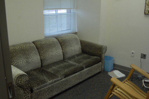 The "Calm Down" room also features a large, comfortable leopard print couch that the students can relax on. 