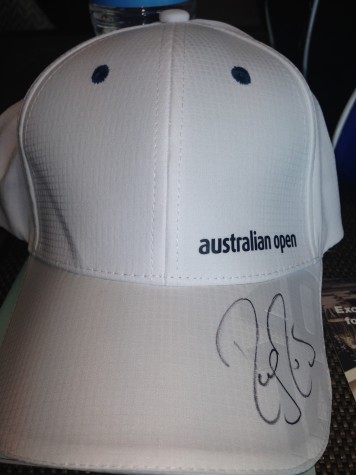 Tennis star Roger Federer signed junior Clarisa Salinas' hat when they met on a casual encounter at the Australian Open.